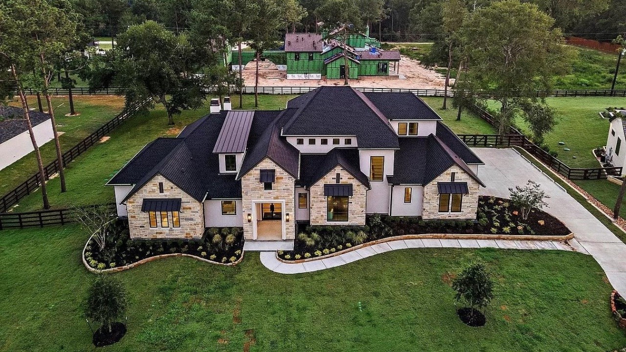 Custom estate surrounded by wooded grounds